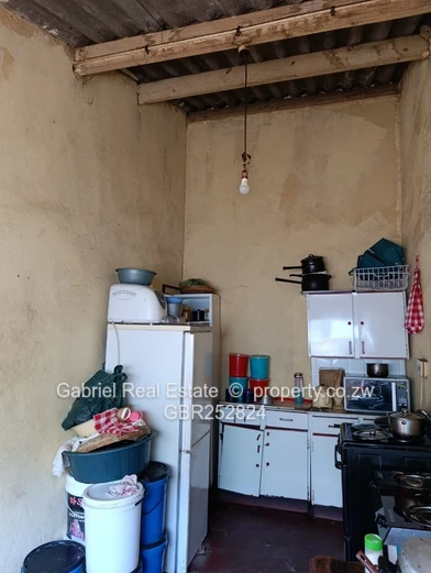 Brick under asbestos family home!